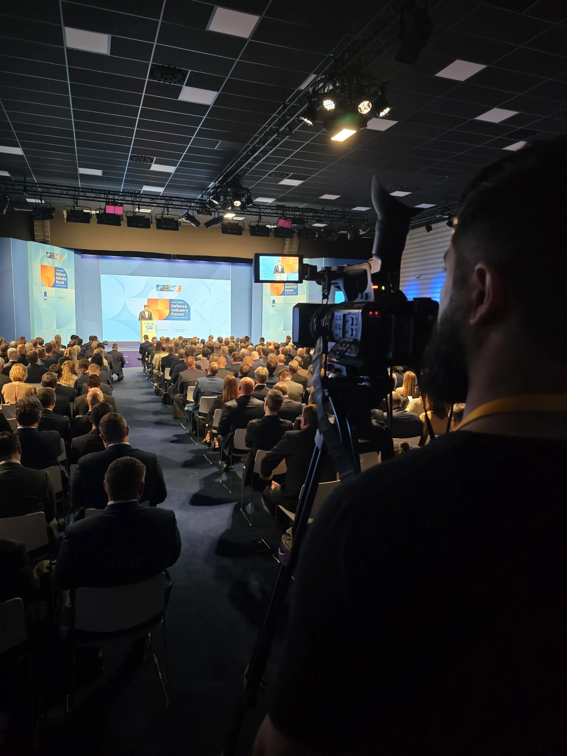 CamJo24 camera operator filming the NATO Summit Defence Industry Forum at World Forum The Hague 2025