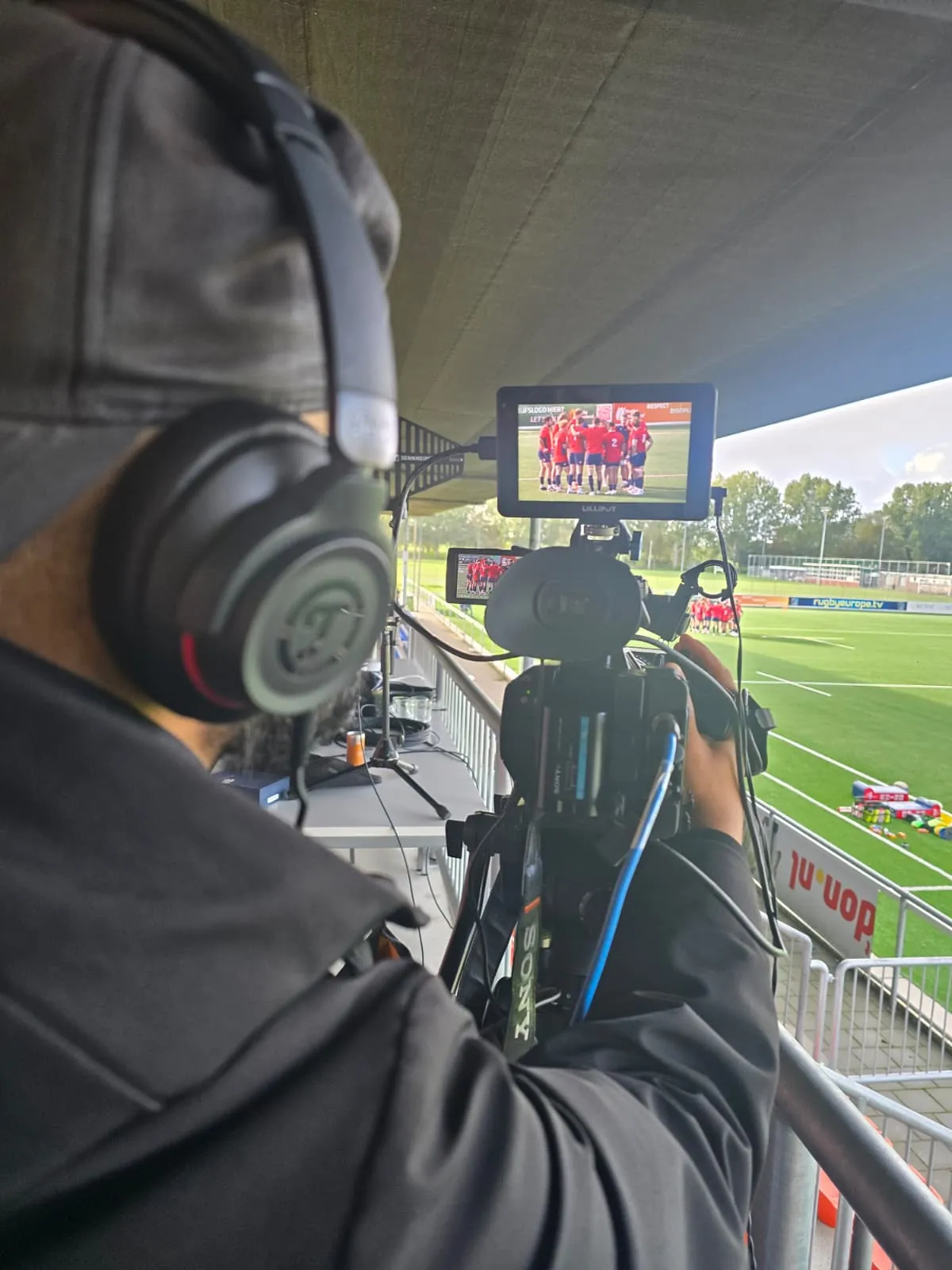 CamJo24 camera operator framing a team huddle for the Rugby Europe Super Cup production